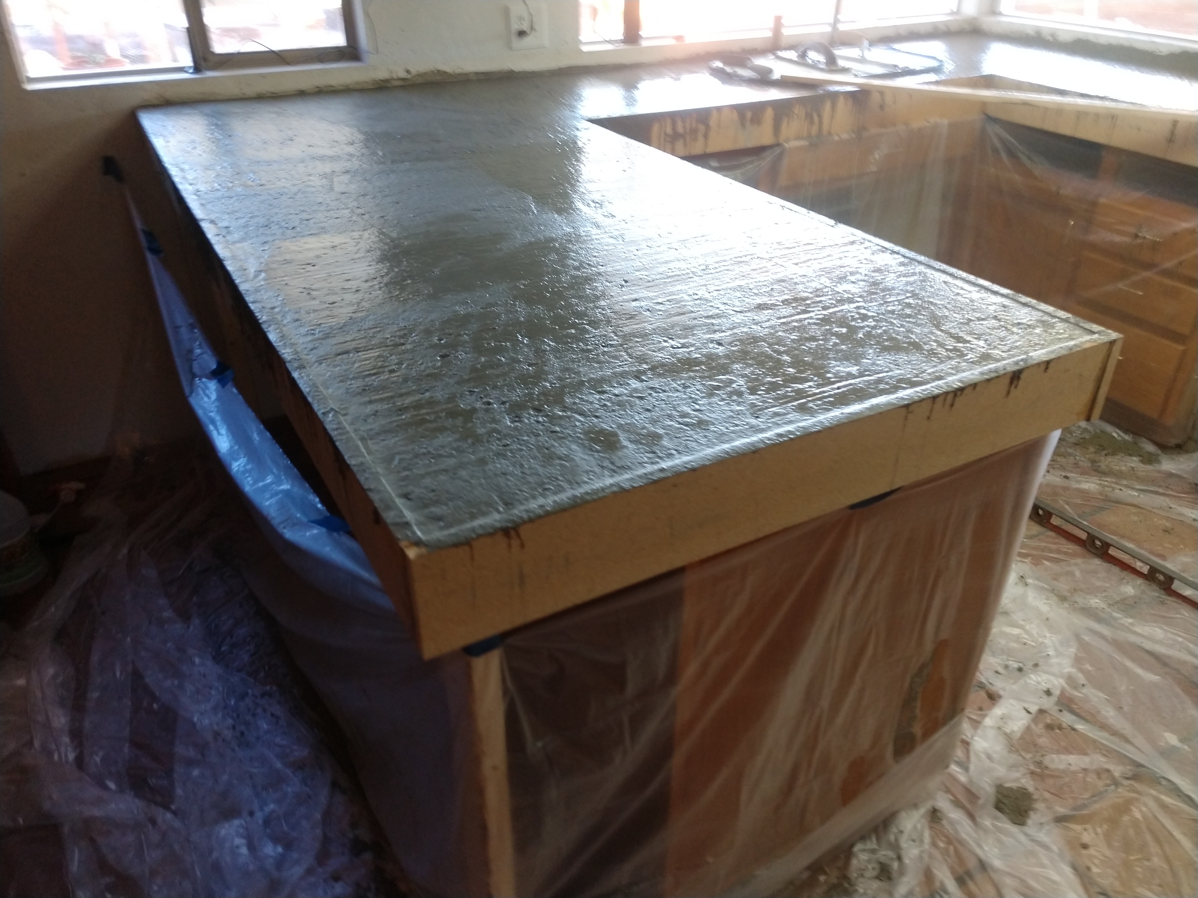 Large concrete countertop island - wet concrete