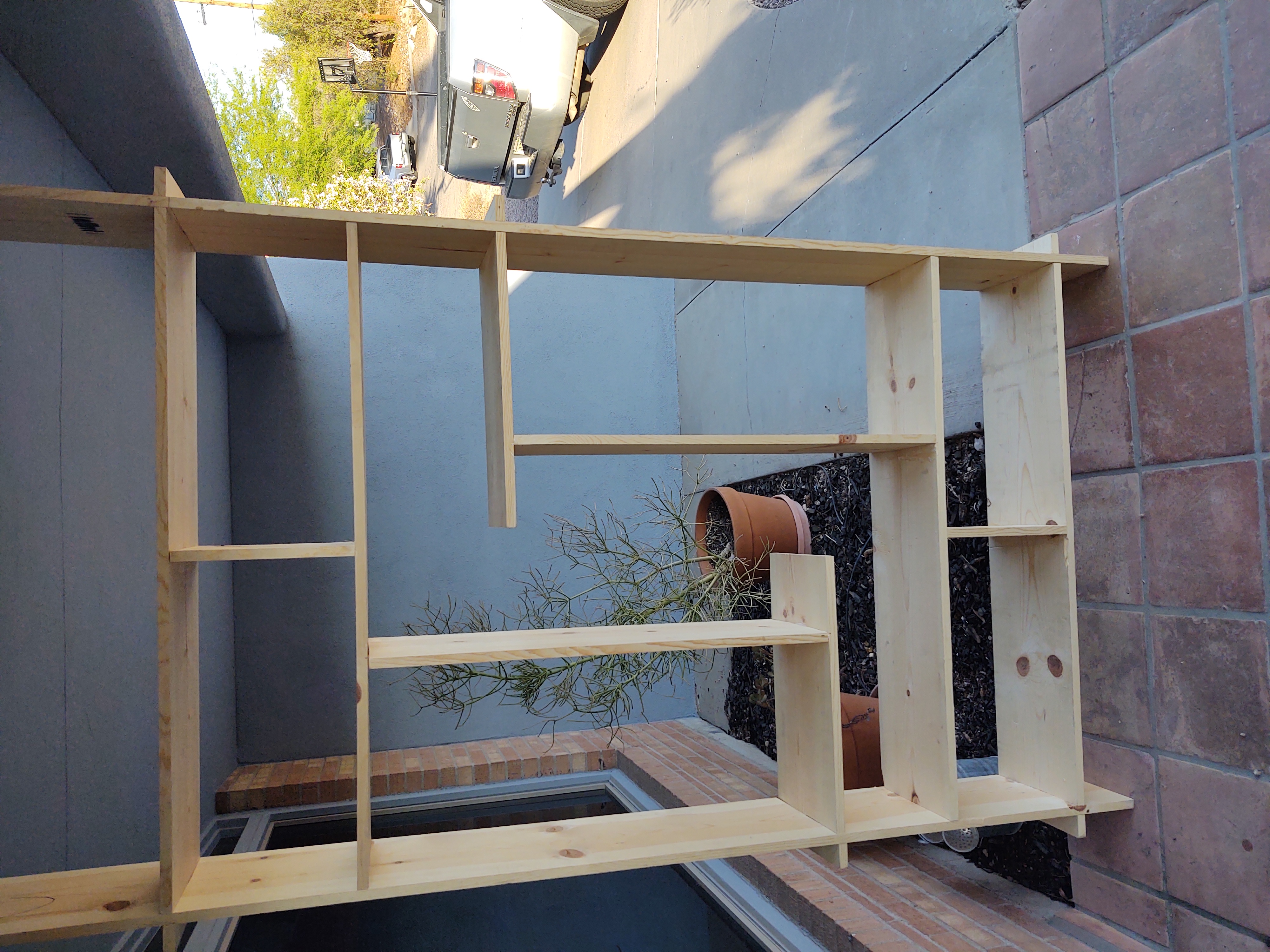 Large custom shelving unit - outdoor assembly